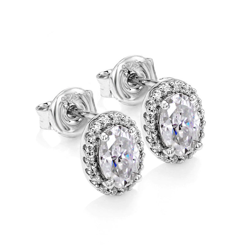 Halo Oval Cut Moissanite Stud Earrings In Sterling Silver