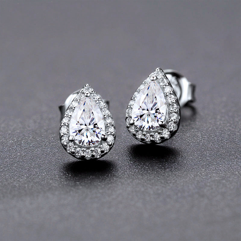 Halo Pear Cut Moissanite Stud Earrings In Sterling Silver