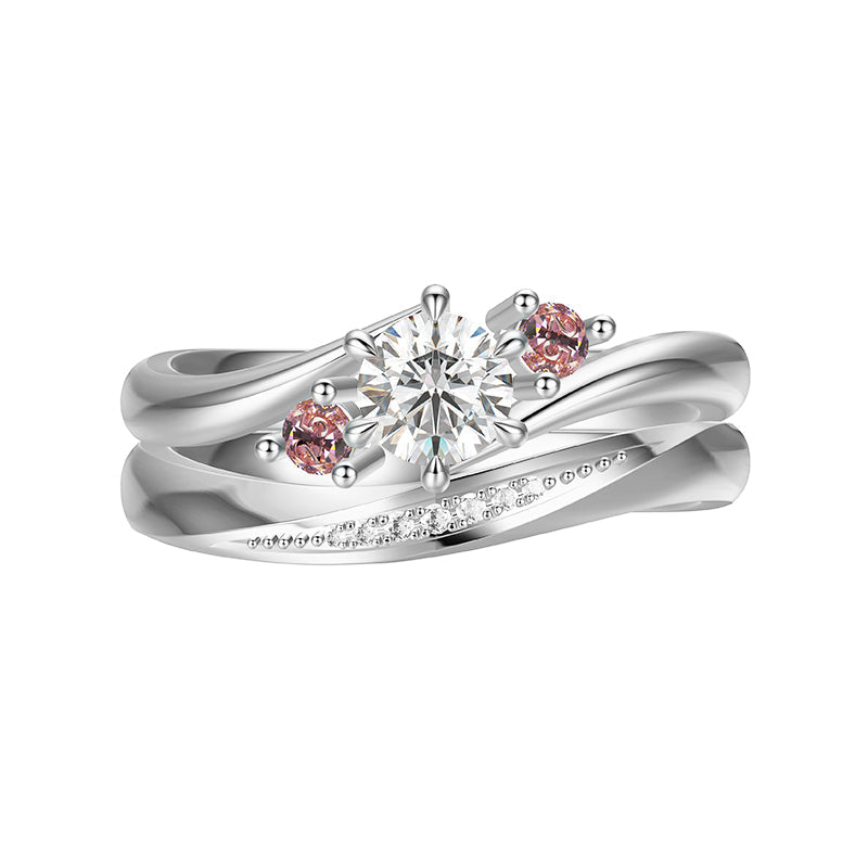 Three Stone Moissanite And Pink Sapphire Bypass Bridal Engagement Ring Set