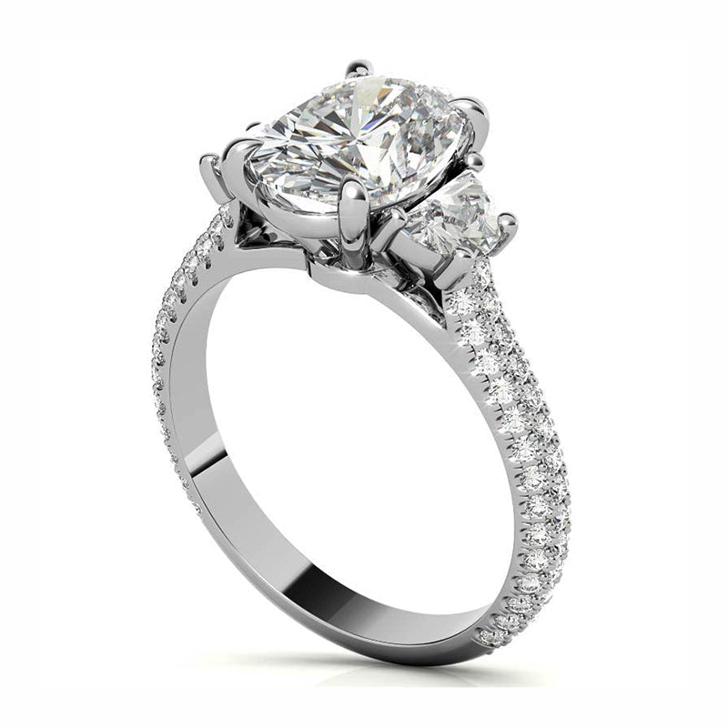 Three Stone Oval Moissanite And Half Moon Triple Pave Engagement Ring