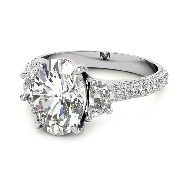 Three Stone Oval Moissanite And Half Moon Triple Pave Engagement Ring